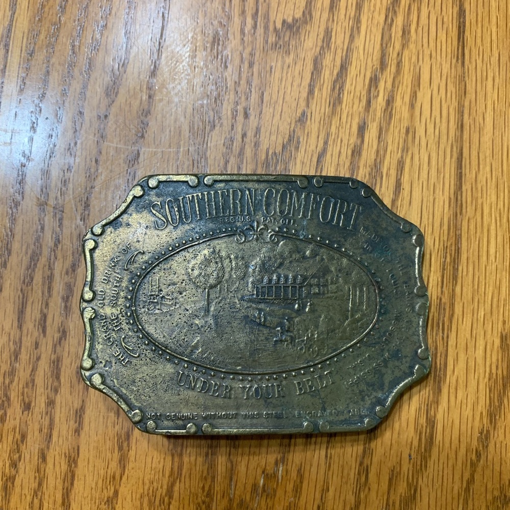 Vintage Southern Comfort brass belt buckle.
